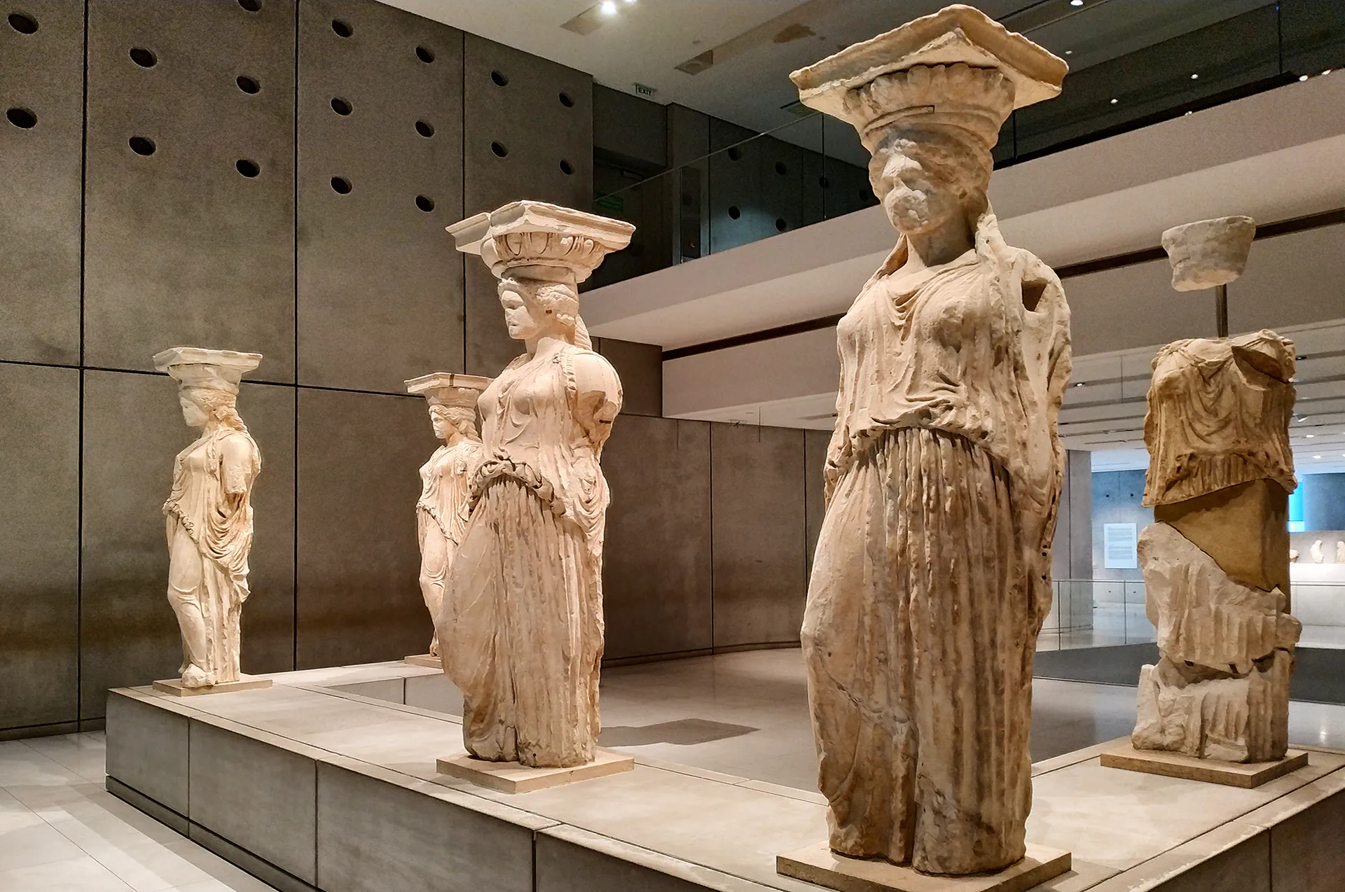 Caryatids at the Acropolis Museum – Ancient Greek sculptures supporting the Erechtheion temple.
