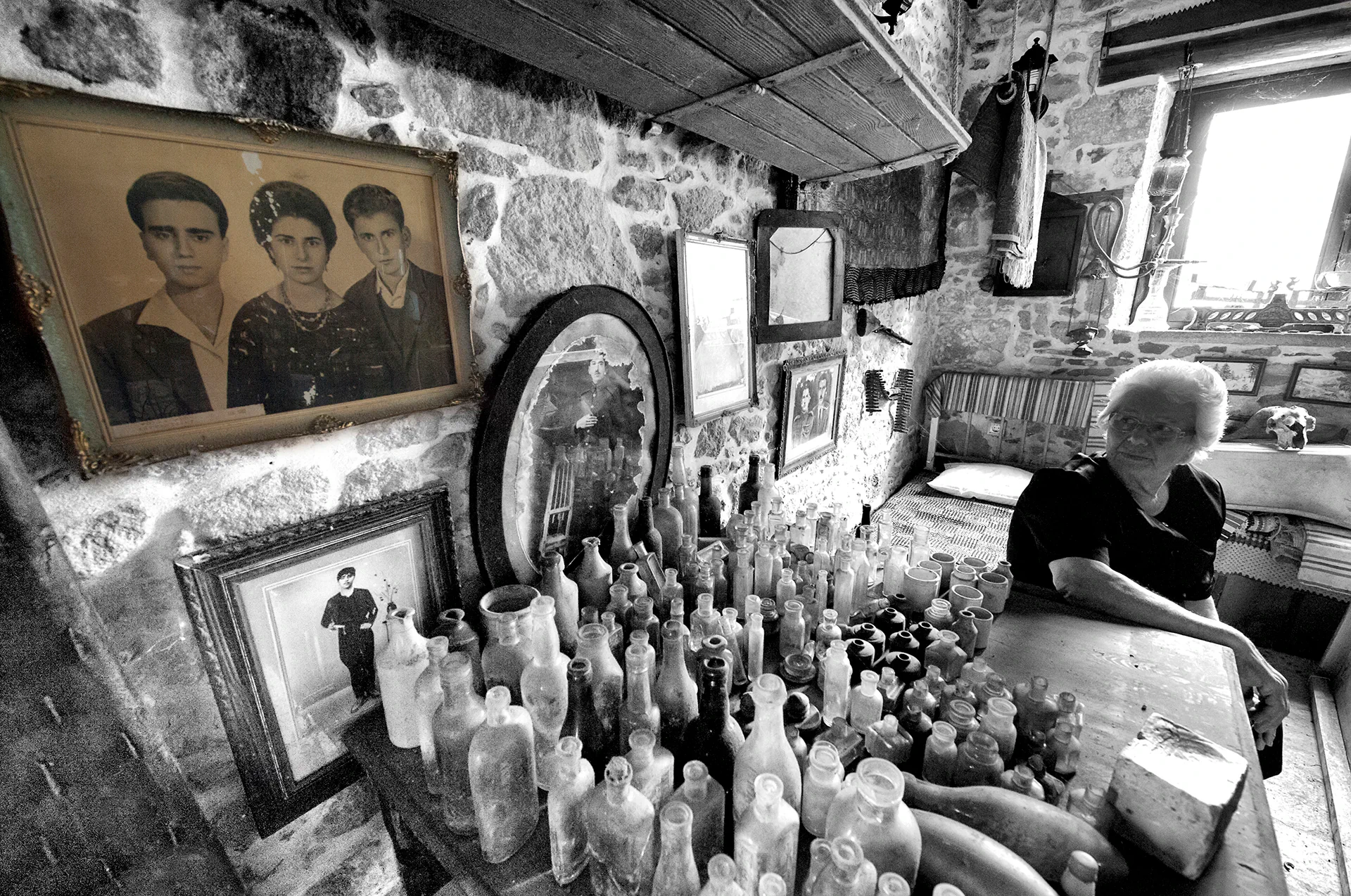 Local guide showing visitors around a typical Cretan village home.