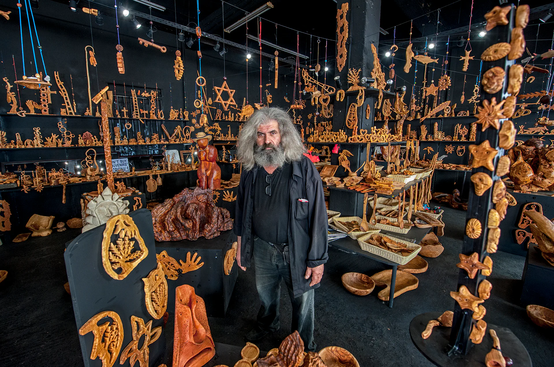 Handcrafted wooden souvenirs made in a Chania woodworking workshop.