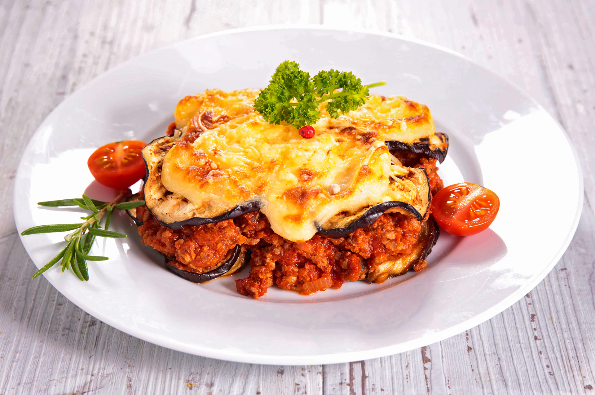 Baked Moussaka fresh from the oven, golden and creamy on top