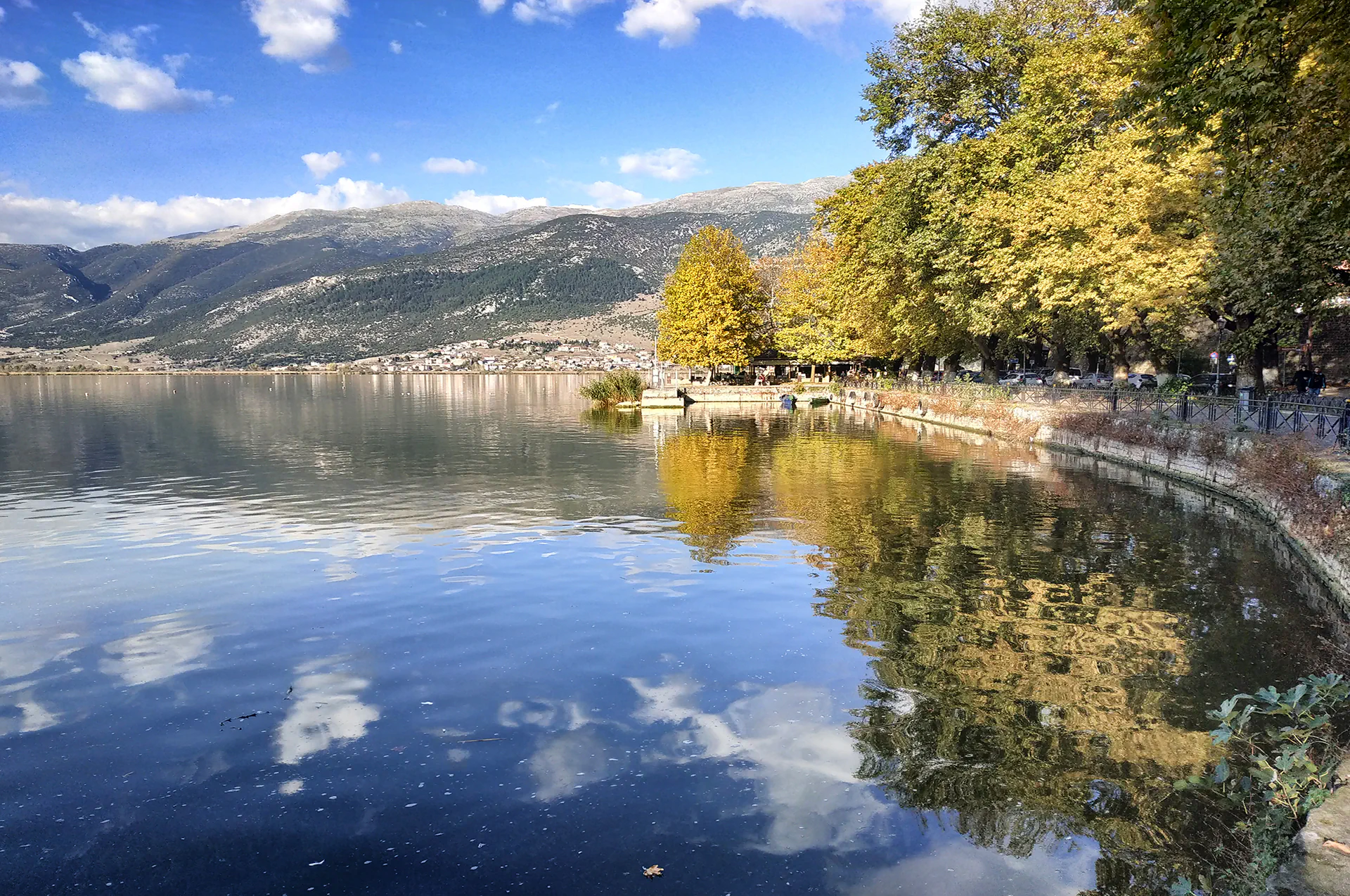 Lake Pamvotida with view of Ioannina’s island and mountains.