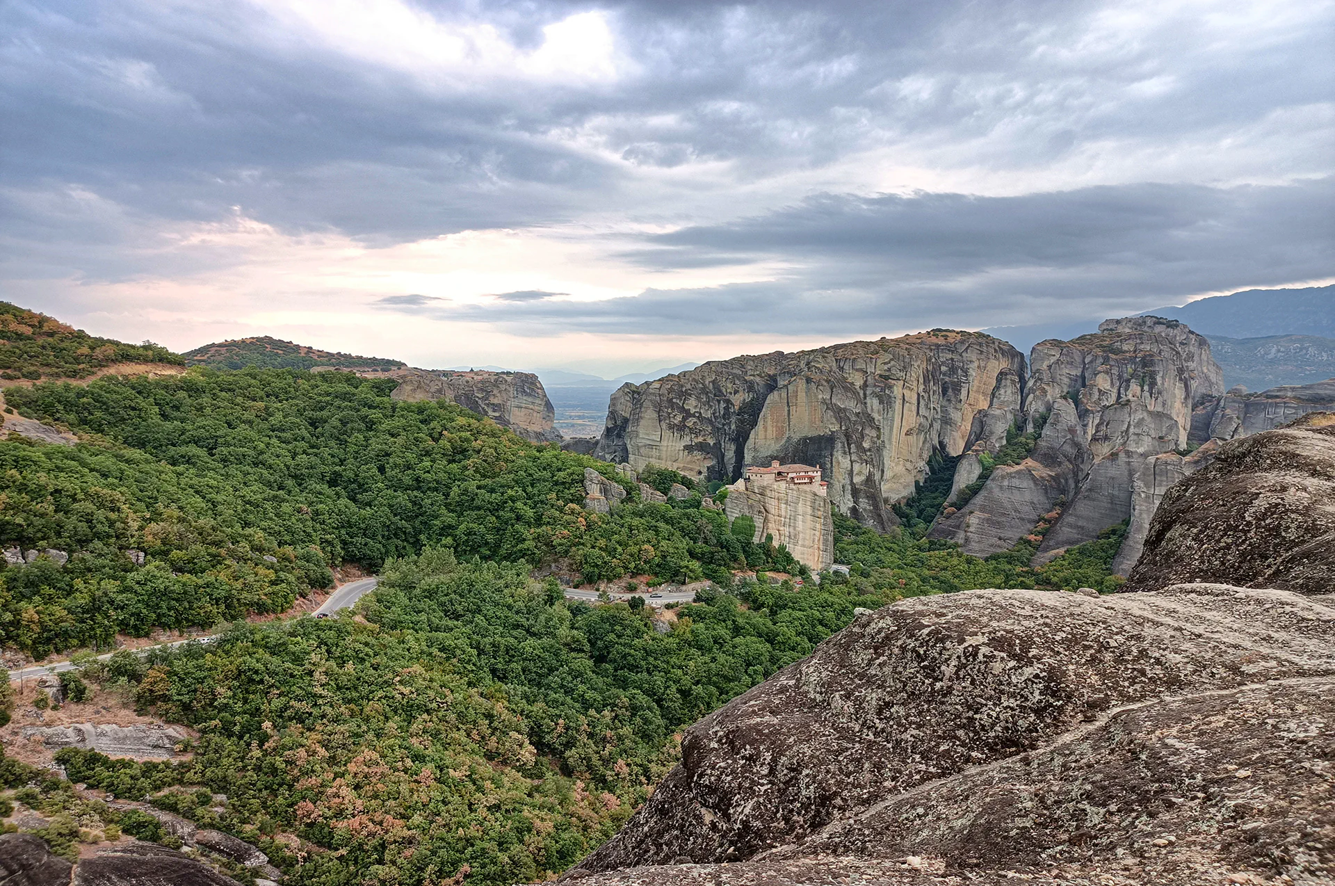 Aerial view of Meteora and its surrounding green valley.