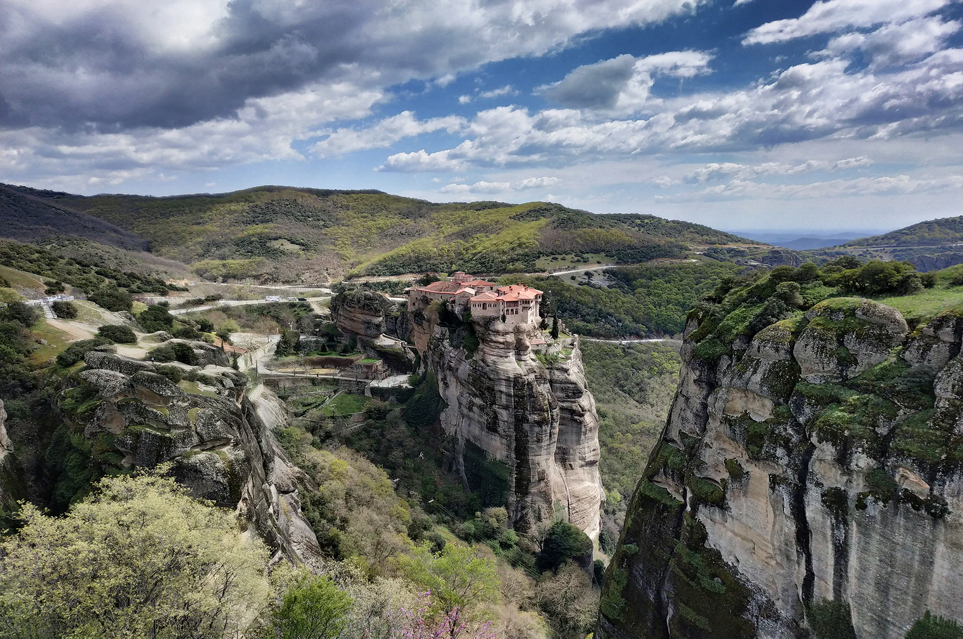 Monasteries of Meteora perched atop massive rock formations.
