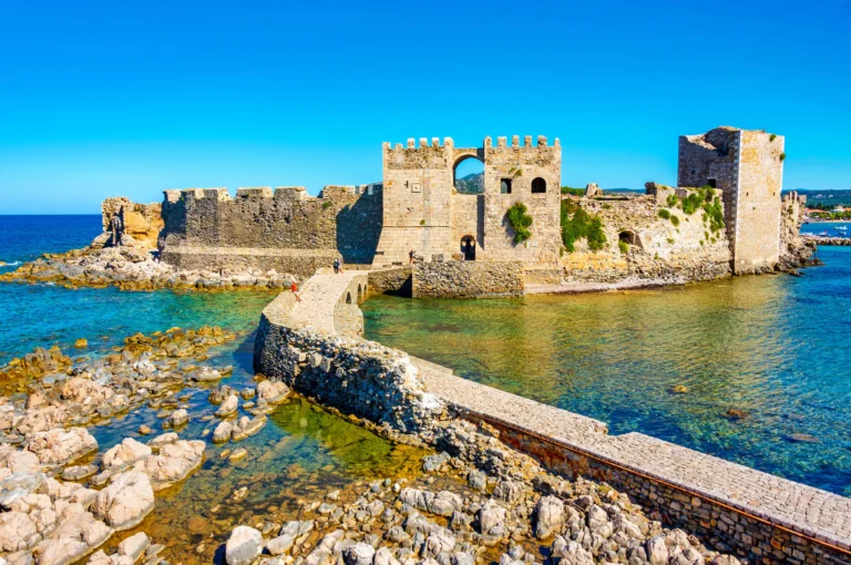 Methoni Castle – Historic Fortress by the Sea Methoni fortress on the coast with turquoise waters