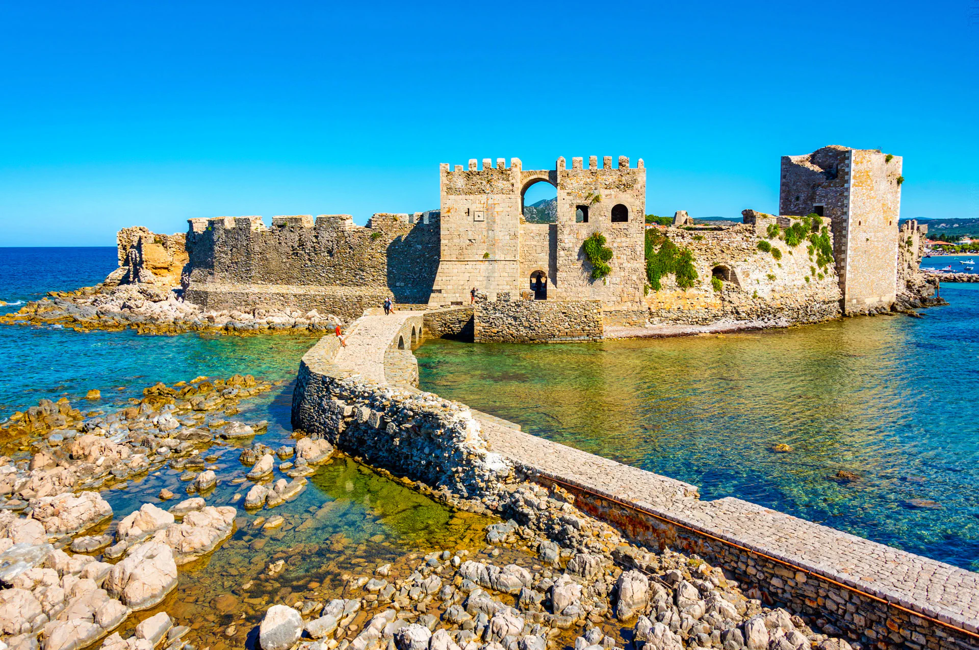Methoni fortress on the coast with turquoise waters