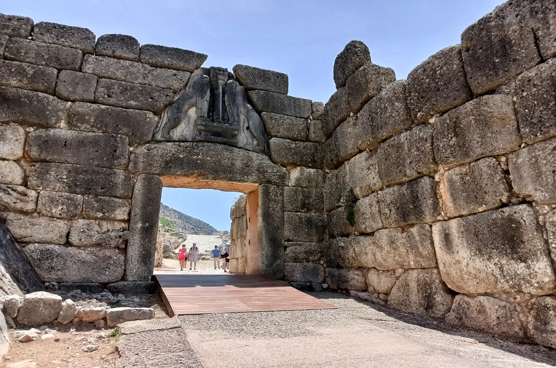Close-up of the Lion Gate entrance at the archaeological site of Mycenae.