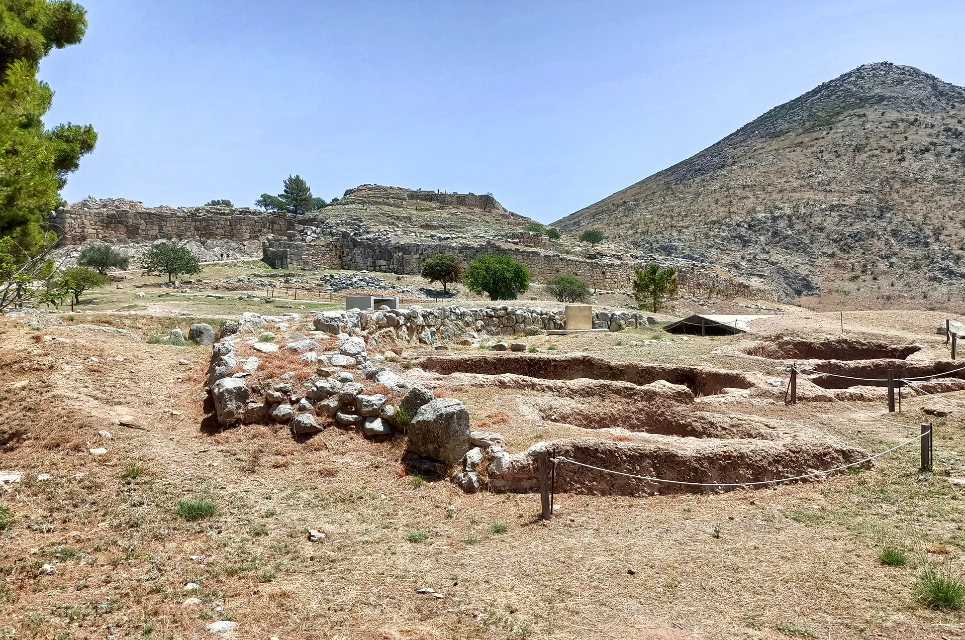 Panoramic view of Mycenae, showcasing its ancient ruins and stunning landscape.