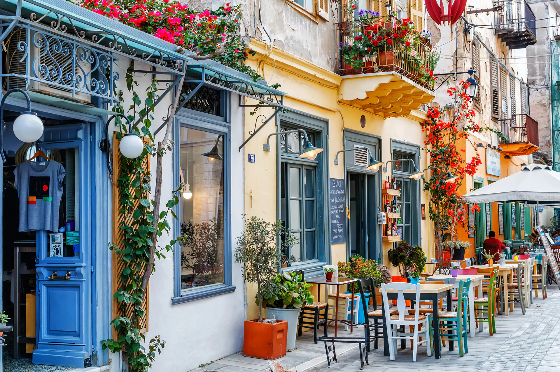 Outdoor tables at a traditional taverna in Nafplion